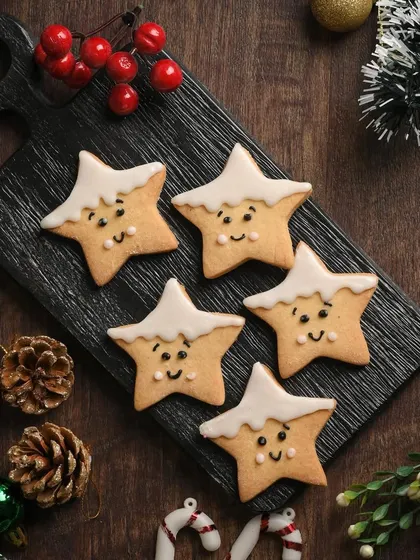 Twinkle, twinkle, little star cookies. These adorable, hand-decorated star-shaped cookies are a sweet and simple treat to share during the holiday season.