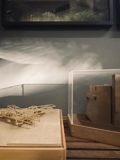 A closer view of the architectural models, including a truss structure and a block model in a plexiglass case. These objects are essential tools for my design thinking.