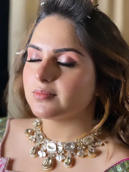 A close-up of the eye makeup for Samya's Roka. The soft pink tones are beautifully blended for a romantic and ethereal effect.