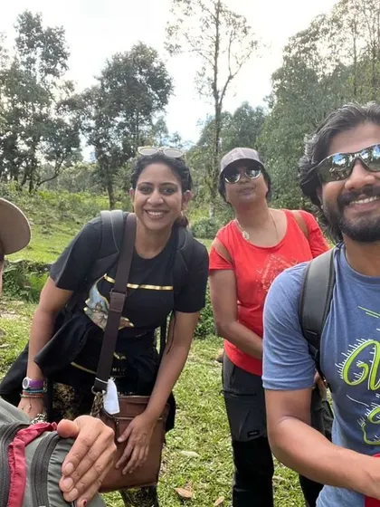 Our group enjoying the journey together, trekking through the vibrant green landscapes of Nepal.