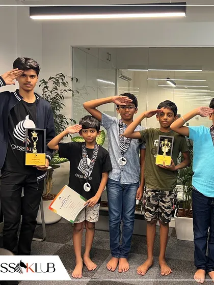 Our young patriots saluting with their trophies after the Independence Day tournament. It was a day of celebrating freedom, strategy, and national pride.
