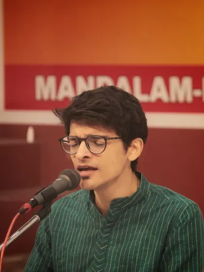 The passion and emotion are evident as this student performs at the 'Swarveni Aradhana'.
