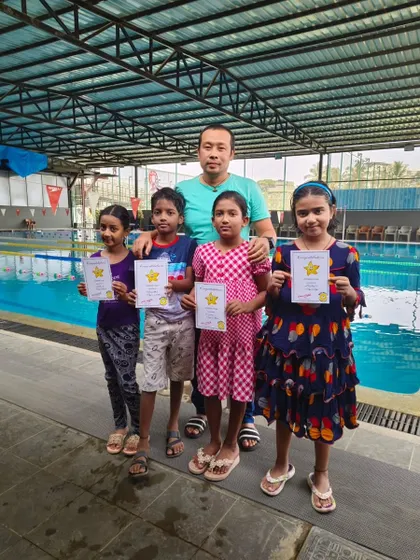 We judge our summer camps by the big smiles on everyone's faces on certificate day. Here are some of our happy swimmers and coaches from our Brigade Road, Koramangala, and Hennur locations.