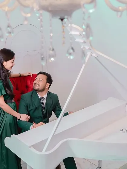 A duplicate of image 100, this photo captures the beautiful connection and shared glance between the couple in an elegant studio setting.