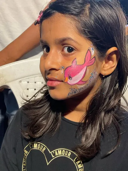 The finished pink dolphin design, looking super cute and ready for a party.
