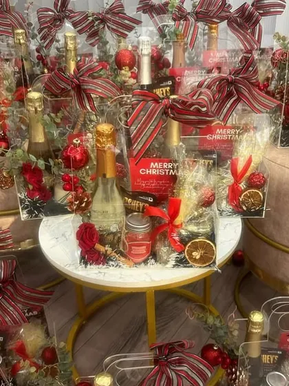 A display of our Christmas hampers, ready to spread some holiday cheer. We can create these in bulk for corporate orders.