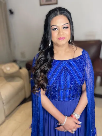 A final shot of this gorgeous client, looking happy and confident with her party makeup.