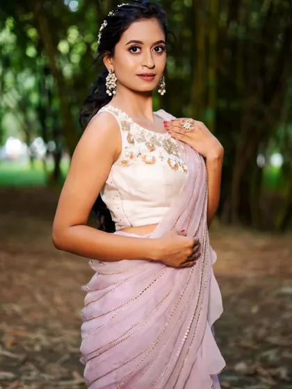 A three-quarter view of the lavender ruffle saree, showing how the light and airy fabric drapes beautifully.