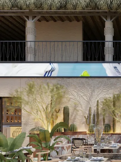 The use of natural materials and greenery is central to the Skyro concept. This area feels like a modern oasis, with comfortable seating nestled among desert and tropical plants.