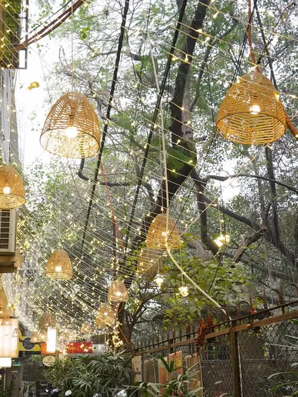 The fairy lights in the trees outside my salon create a magical atmosphere in the evenings, welcoming you into a world of tranquility.