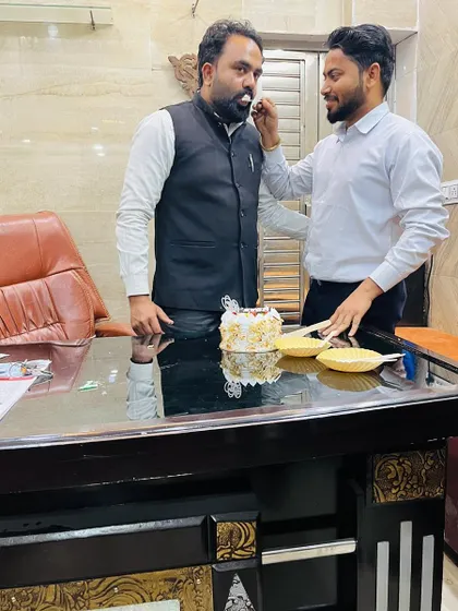 A candid moment from a birthday celebration in the office. These small celebrations build great team morale.