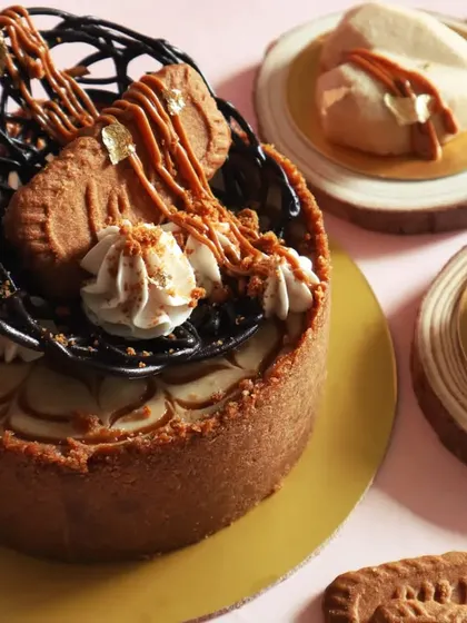 Here you can see the details of my Biscoff cheesecake, from the chocolate work to the piped cream and biscuit garnish. I love making my desserts look as good as they taste.