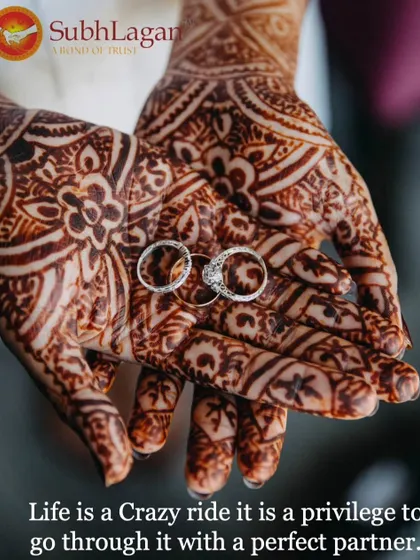 Wedding rings rest in the bride's henna-covered palms, a beautiful symbol of union. Life is a crazy ride, and we help you find the perfect partner to share it with.