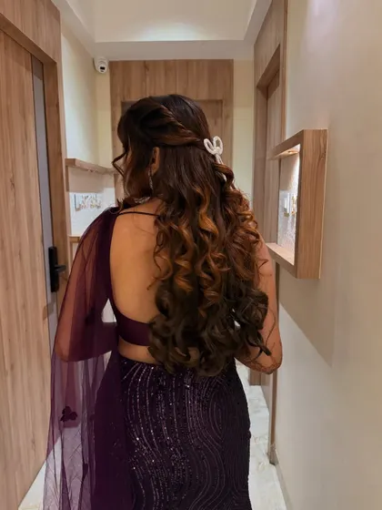From another angle, you can see the beautiful texture and volume in her sangeet hairstyle. It’s designed to have a lot of movement for a night of dancing.