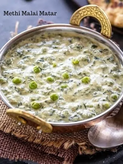 Our winter special Methi Malai Matar, a creamy and rich curry made with fresh fenugreek leaves, green peas, and cream.