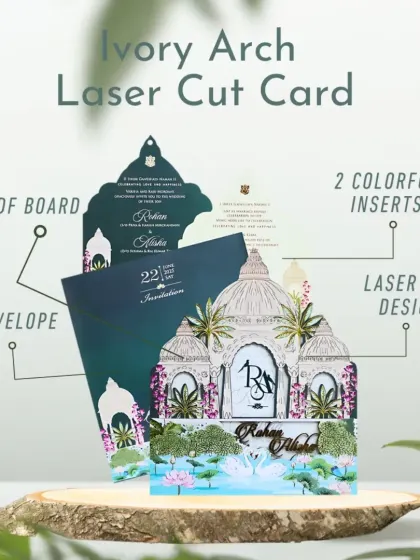This ivory arch laser-cut card features a stunning palace design with swans. It comes with an MDF board and two colorful inserts, perfect for a fairytale wedding.