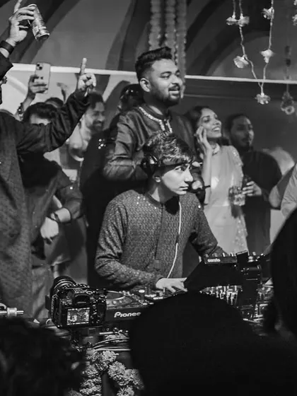 A classic black and white moment from a great night. Even without color, you can feel the energy and joy from the crowd as they celebrate and dance.