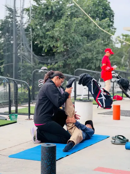 Physical training goes beyond the gym. Our athletes participate in group warm-ups, stretching sessions, and running drills on the course to build functional fitness.