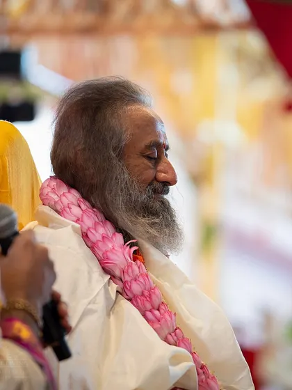 A moment of deep meditation during a Homa ceremony at the start of Navratri. These fire rituals are performed to purify the environment and the mind, setting the stage for deep spiritual experiences.