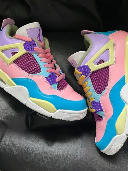 Another angle of the colorful, upcycled Jordan 4 sneakers.