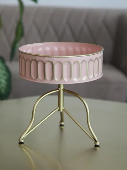 This unique pink and gold serving bowl on a tripod stand is a modern and playful addition to our collection. It’s perfect for serving snacks or as a decorative catch-all bowl.