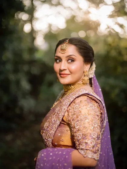 The bride looking over her shoulder, a classic and elegant bridal portrait.