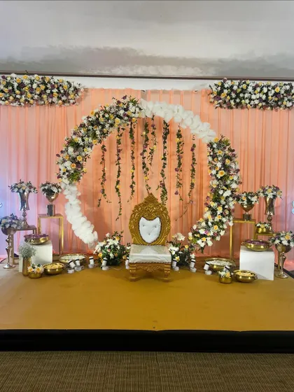 A full view of the popular floral ring backdrop. This versatile design can be adapted for many types of celebrations, from naming ceremonies to milestone birthdays, always creating a stunning focal point.
