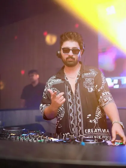 Pointing to the crowd, bringing the energy at Badmaash Sarjapur.