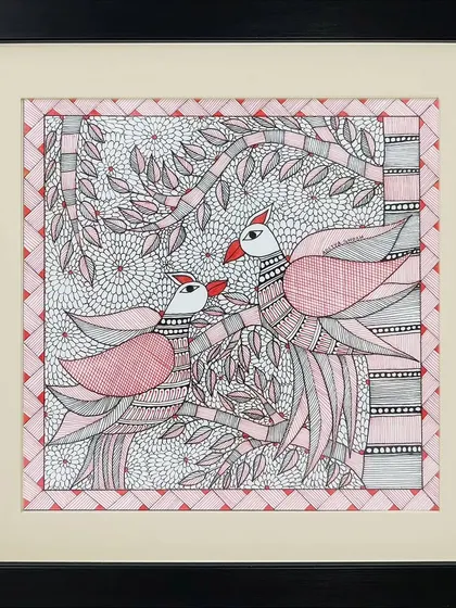 Two birds sit among the branches of a tree in this lovely Madhubani painting by Rinki Joshi. The entire piece is filled with detailed patterns, from the leaves on the tree to the feathers on the birds.