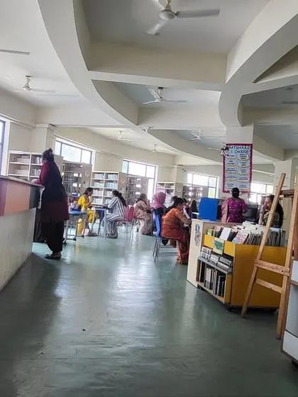 A wide shot of the bustling library at Capstone School. I was honored to be invited as a judge for their literary competition and inspired by the students' creativity.