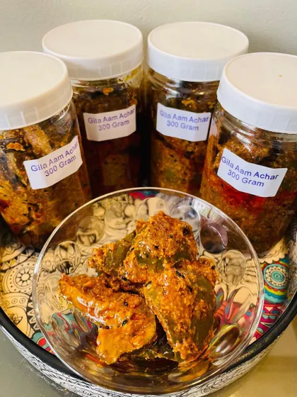 It's mango season, which means it's time for my classic North Indian style Aam ka Achaar. This is the spicy version, also called Gila Aam Achar, made with raw mango chunks and a blend of traditional spices.
