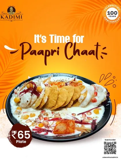 Tangy and Sweet Paapri Chaat. A delightful street food classic, our Paapri Chaat is a mix of crispy wafers, potatoes, chickpeas, and yogurt, topped with sweet and tangy chutneys.