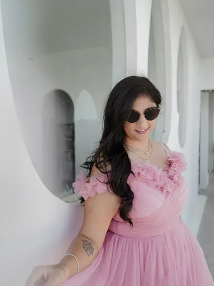 Another shot of the client in her pretty pink gown, looking effortlessly stylish.