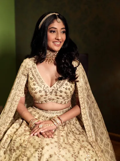 A radiant smile from my beautiful bride. This look is all about achieving that lit-from-within glow, perfect for a sophisticated and luxurious wedding event.