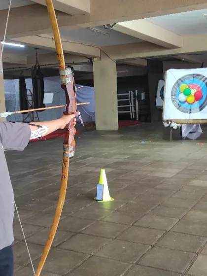 This is what pure focus looks like. I guide every student, young or old, to find their stance, steady their hand, and let the arrow fly. It all starts with learning the correct form.
