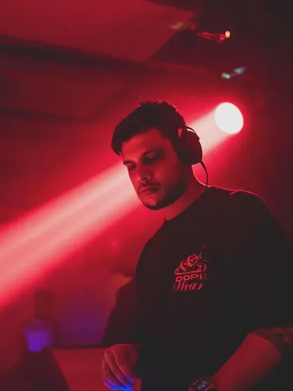 A moody shot under red lights. The lighting in a club is like another instrument, and I use it to build the atmosphere of my set.