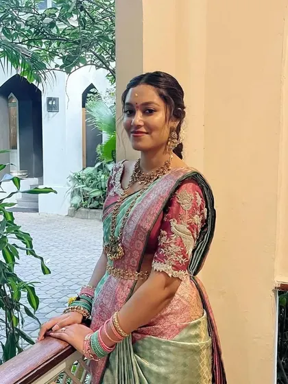 Another beautiful shot of the bride. The intricate details of her jewelry and the embroidery on her blouse are simply breathtaking.
