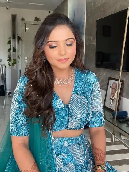 A close-up on this beautiful glass skin look. You can see the luminous finish and the soft, shimmery eyeshadow that makes her eyes pop.
