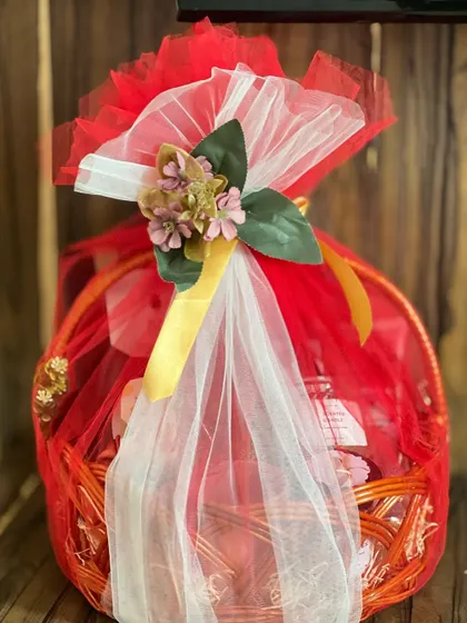Another shot of the red corporate farewell hamper, showing its beautiful and full presentation.