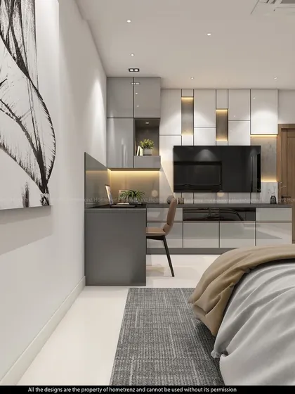 A side view of the bedroom, showing the large piece of abstract art that complements the modern, grey-toned interior.