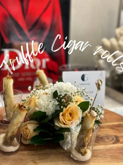 My signature Truffle Cigar Rolls are a true indulgence. These crispy rolls are filled with a creamy, aromatic truffle mixture and served in individual glasses for an elegant touch.