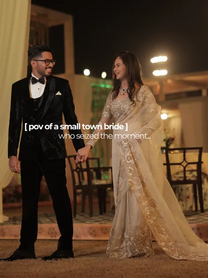 The moment Prakriti seized her moment, holding hands with her groom, her elegant saree a surprising yet perfect choice for her reception.
