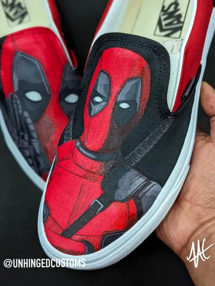 A detailed close-up of Deadpool's portrait on the Vans. Getting the texture and shading right was key to this design.