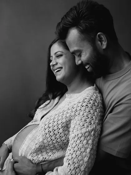 A beautiful black and white photo capturing a moment of pure joy and laughter between the couple. These are the in-between moments I love to capture.