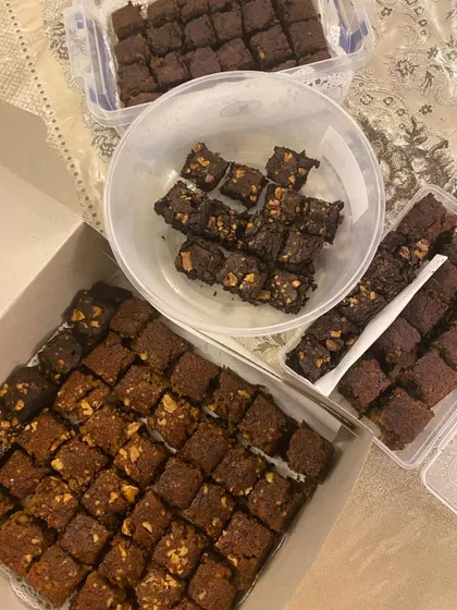 Getting large orders ready, like these boxes of my moist Date and Walnut cake and fudgy chocolate walnut brownies.