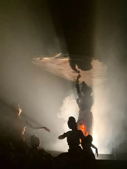 We believe in creating a complete sensory experience. This silhouette from "KRISHNA" showcases our use of atmospheric smoke and backlighting to build suspense and evoke a sense of the mystical, making the performance unforgettable.