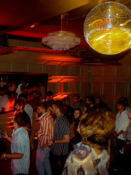 The disco ball says it all. It’s all about creating an electric atmosphere where you can let loose.
