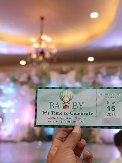 A custom 'Boarding Pass' invitation for a travel-themed baby shower, setting the tone from the very beginning.