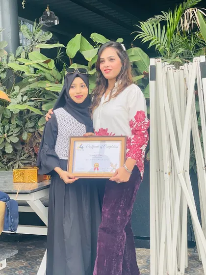 Another happy student receiving her certificate. My goal is to empower women to turn their passion into a profession.