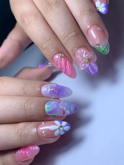 A whimsical, multi-colored set perfect for spring. It features 3D flowers, textured gel, and a pastel rainbow of colors.